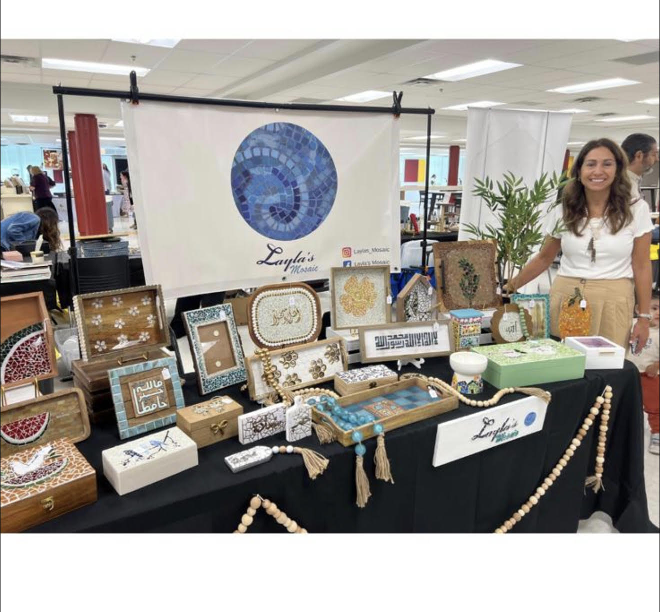 Dania Shihabi at a local art market with the full Layla's Mosaic collection