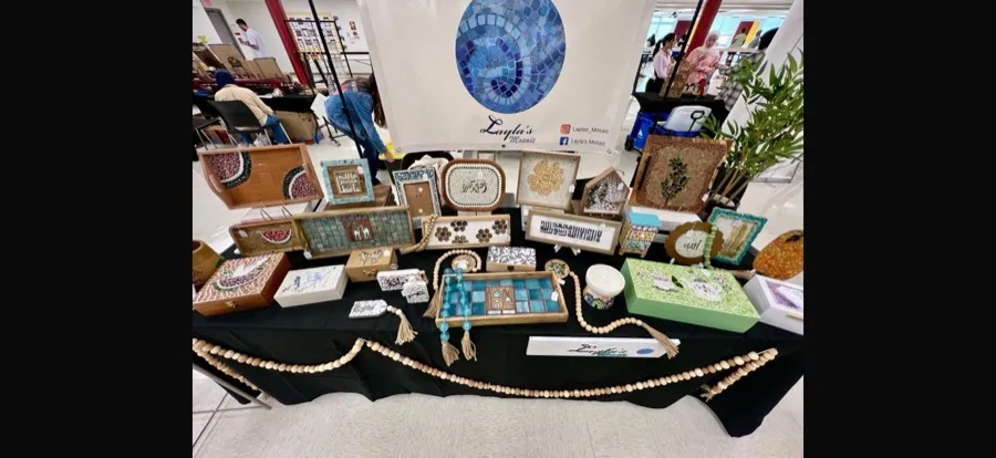 Full collection display at an art bazaar featuring mosaic pieces by Layla's Mosaic